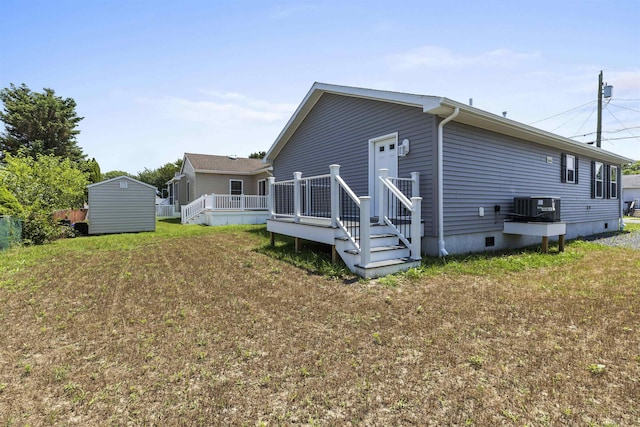 108 Sunray Beach Rd, Del Haven, NJ 08251 - back of house featuring crawl space, a wooden deck, and a storage unit