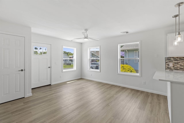 108 Sunray Beach Rd, Del Haven, NJ 08251 - unfurnished living room featuring light wood-style flooring and ceiling fan