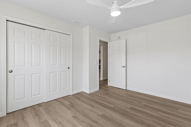 108 Sunray Beach Rd, Del Haven, NJ 08251 - unfurnished bedroom featuring wood finished floors, a closet, and ceiling fan