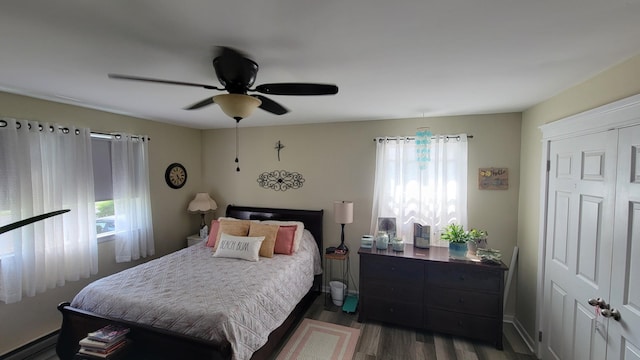 113 Heidi Ave, North Cape May, NJ 08204 - bedroom with multiple windows, wood finished floors, a baseboard heating unit, and a ceiling fan