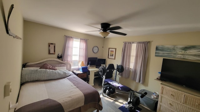 113 Heidi Ave, North Cape May, NJ 08204 - bedroom with wood finished floors, ceiling fan, and an office area