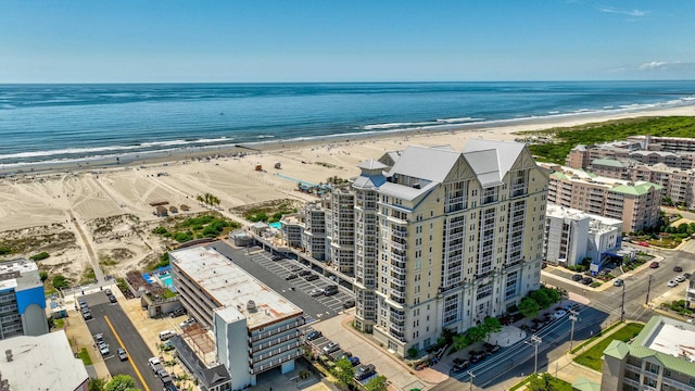 aerial view with a view of the beach and a water view