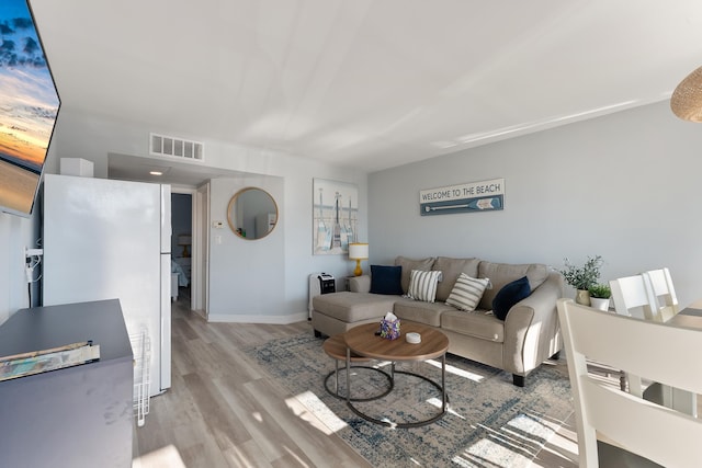 living room featuring light wood-type flooring