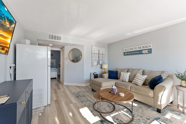 living room featuring light hardwood / wood-style flooring