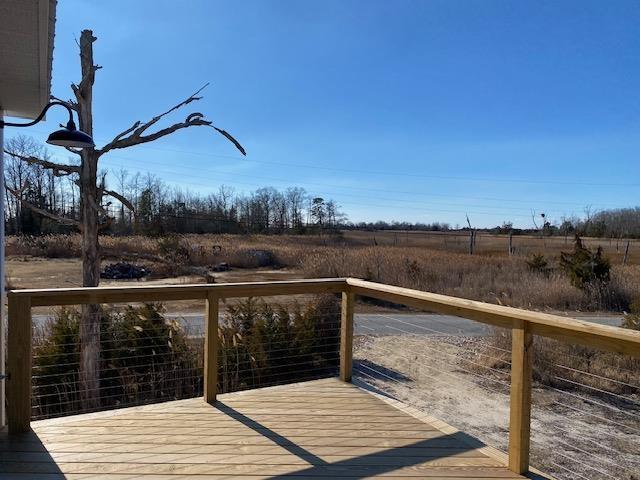 deck featuring a rural view