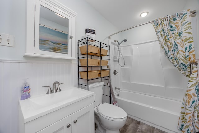 full bathroom featuring wood-type flooring, vanity, toilet, and shower / bath combo