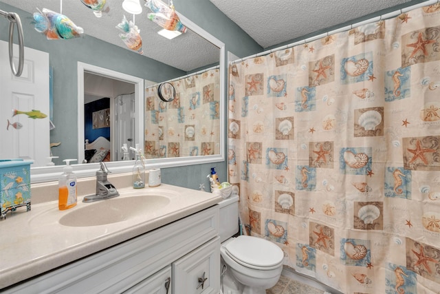 301 E S Station Ave Unit 126, Lower Township, NJ 08260 - bathroom with vanity, a textured ceiling, toilet, and walk in shower