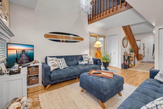 301 E S Station Ave Unit 126, Lower Township, NJ 08260 - living room featuring an inviting chandelier and light hardwood / wood-style flooring
