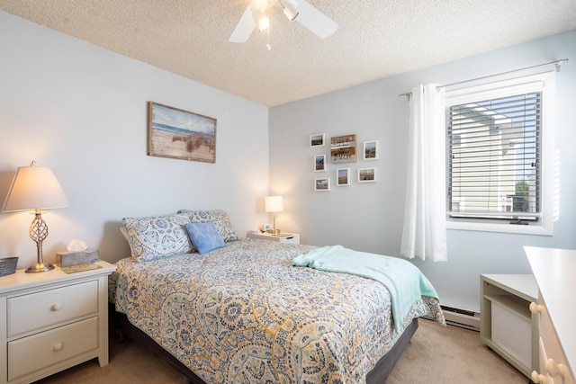 carpeted bedroom featuring ceiling fan, a textured ceiling, and a baseboard radiator