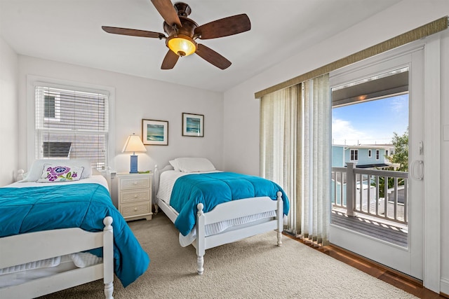 364 41st St E, Unit East, Avalon, NJ 08202 - bedroom with access to outside, multiple windows, and ceiling fan