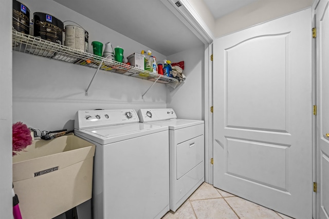 364 41st St E, Unit East, Avalon, NJ 08202 - laundry room featuring washer and clothes dryer and light tile patterned floors