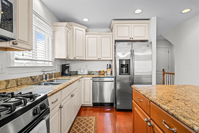 364 41st St E, Unit East, Avalon, NJ 08202 - kitchen featuring stainless steel appliances, dark wood finished floors, light stone counters, brown cabinetry, and recessed lighting