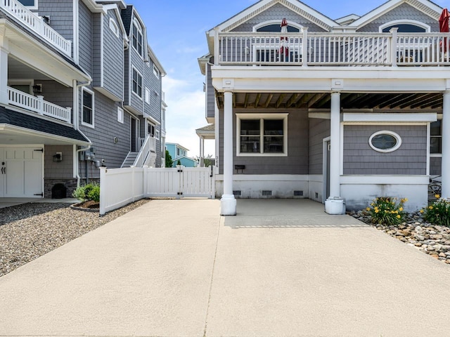 364 41st St E, Unit East, Avalon, NJ 08202 - view of front of house with a gate, crawl space, and a balcony