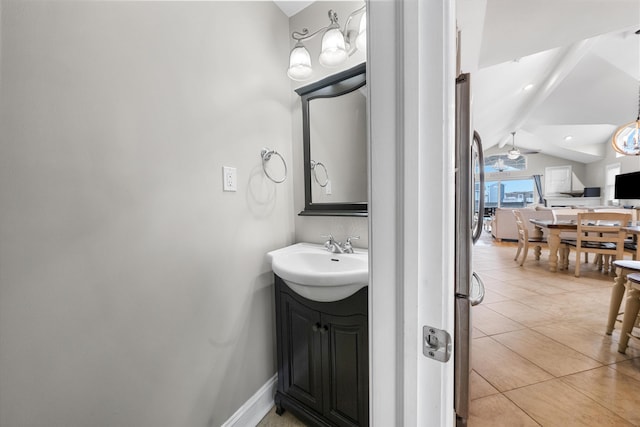 32 47th St E Unit, East Unit, Sea Isle City, NJ 08243 - bathroom with vaulted ceiling, vanity, and tile patterned floors