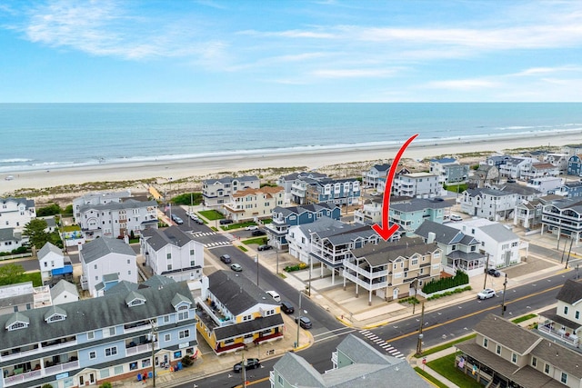 32 47th St E Unit, East Unit, Sea Isle City, NJ 08243 - bird's eye view of waterfront with a beach