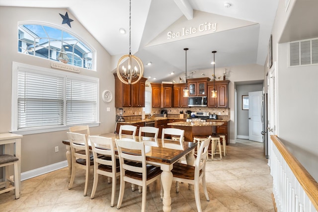 32 47th St E Unit, East Unit, Sea Isle City, NJ 08243 - dining room with lofted ceiling, a chandelier, healthy amount of natural light, and recessed lighting