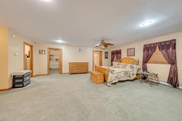 bedroom with light carpet, connected bathroom, and ceiling fan