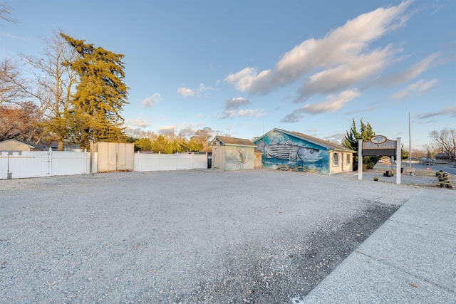 view of front of house with a storage unit