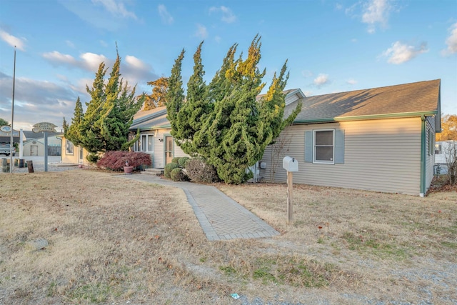 exterior space with a front yard