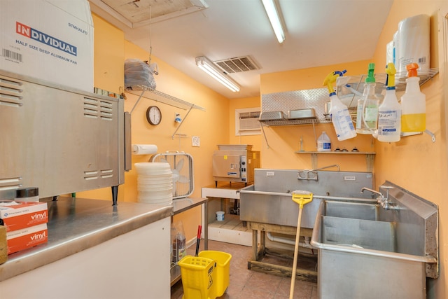 utility room with a wall mounted AC