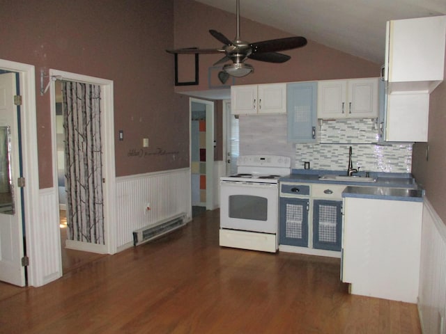 kitchen with vaulted ceiling, ceiling fan, sink, electric range, and white cabinets