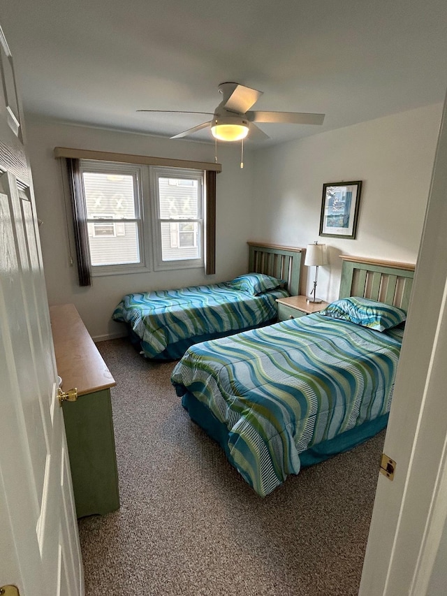 bedroom featuring carpet and ceiling fan