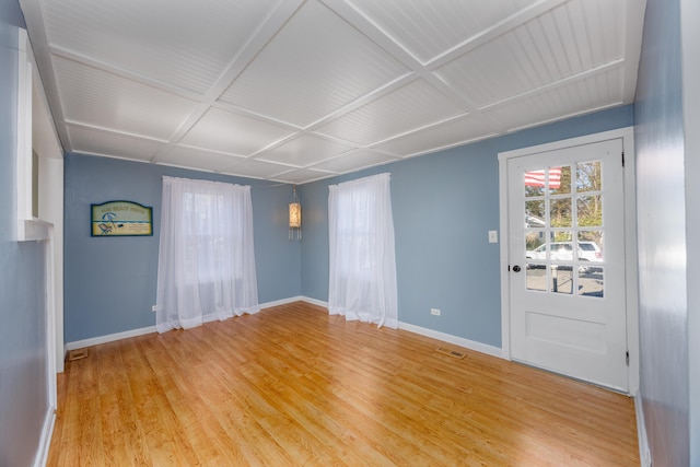 unfurnished room featuring wood-type flooring