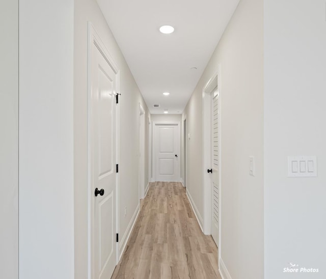 3130 Pacific Ave Unit 3130, Wildwood, NJ 08260 - hallway featuring light wood-style flooring, baseboards, and recessed lighting