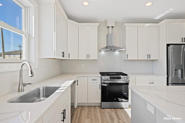3130 Pacific Ave Unit 3130, Wildwood, NJ 08260 - kitchen featuring appliances with stainless steel finishes, a sink, wall chimney exhaust hood, white cabinets, and recessed lighting