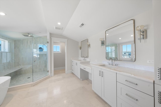 bathroom with vaulted ceiling, visible vents, a shower stall, and a wealth of natural light