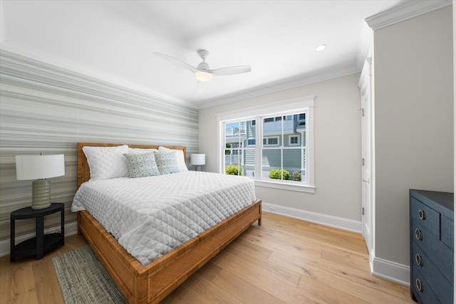 bedroom with light wood finished floors, baseboards, ceiling fan, ornamental molding, and recessed lighting