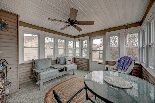 sunroom / solarium featuring wood ceiling and ceiling fan