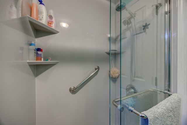 bathroom featuring an enclosed shower