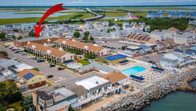 aerial view with a residential view and a water view