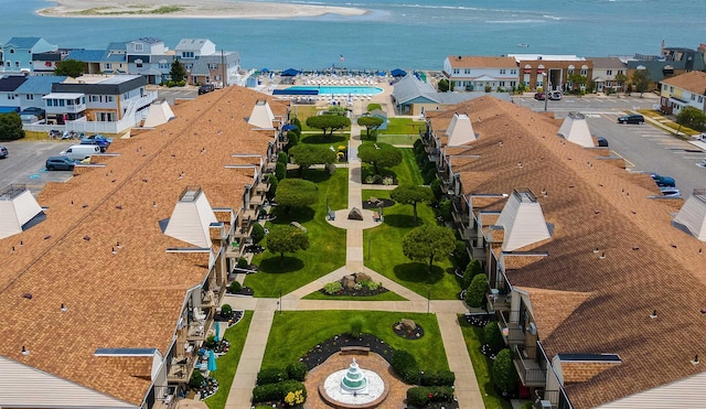 aerial view with a residential view and a water view