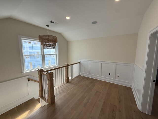 unfurnished room featuring crown molding and light hardwood / wood-style floors