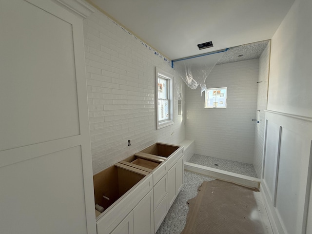 bathroom with a shower