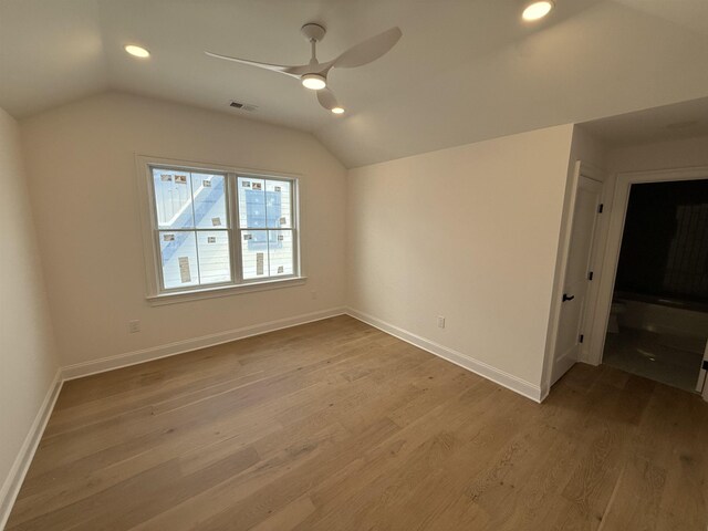 bathroom featuring wood walls