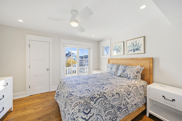 bedroom with ceiling fan, access to exterior, and light wood-type flooring