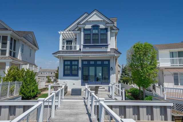 view of front of home with a wooden deck