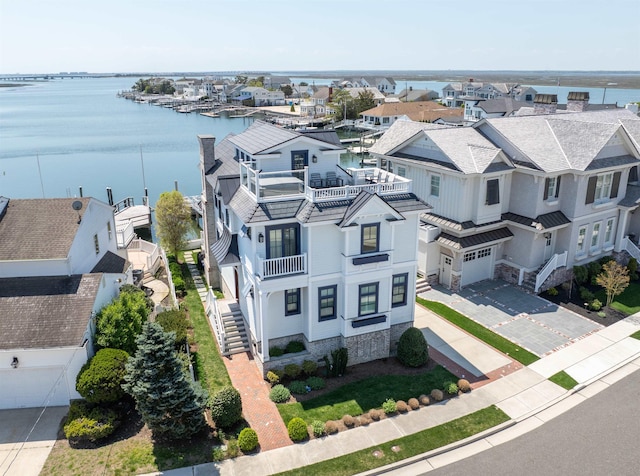 bird's eye view with a water view