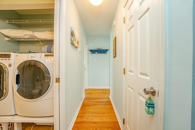3817 Central Ave Unit 1St, Sea Isle City, NJ 08243 - laundry area with light wood-style flooring and washer and clothes dryer