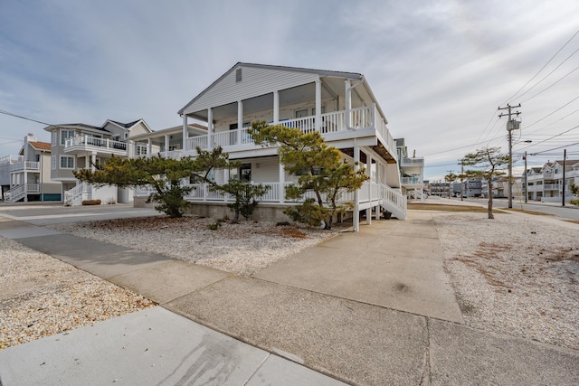 3817 Central Ave Unit 1St, Sea Isle City, NJ 08243 - beach home with a porch, a residential view, and driveway