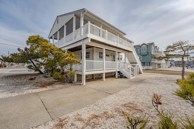 3817 Central Ave Unit 1St, Sea Isle City, NJ 08243 - rear view of property featuring a balcony and a porch