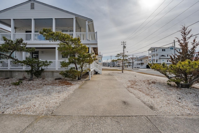 3817 Central Ave Unit 1St, Sea Isle City, NJ 08243 - view of side of property featuring a porch