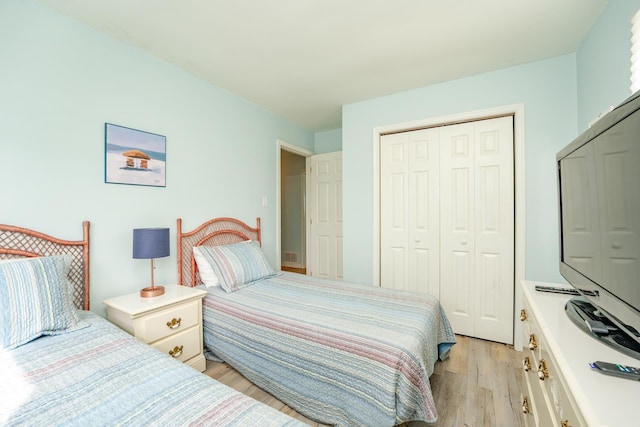 3817 Central Ave Unit 1St, Sea Isle City, NJ 08243 - bedroom with light wood-style flooring and a closet