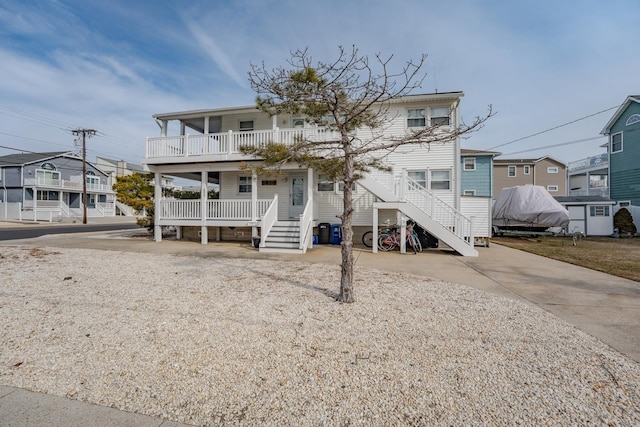 3817 Central Ave Unit 1St, Sea Isle City, NJ 08243 - view of front facade with a porch, stairs, and a residential view