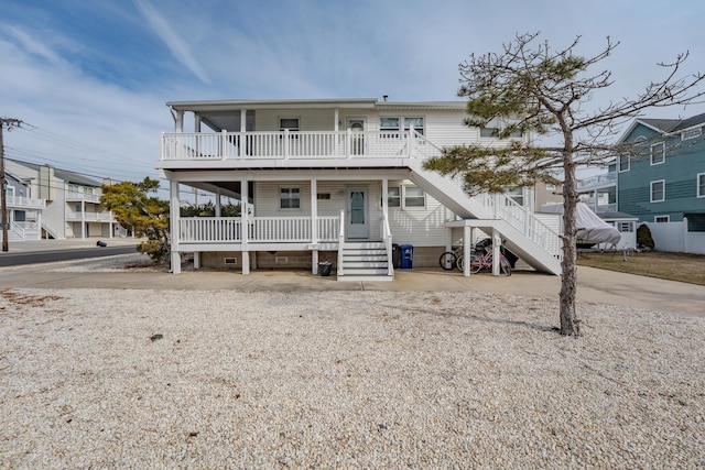 3817 Central Ave Unit 1St, Sea Isle City, NJ 08243 - rear view of property featuring covered porch and stairway