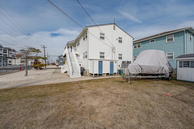 3817 Central Ave Unit 1St, Sea Isle City, NJ 08243 - rear view of property featuring stairs