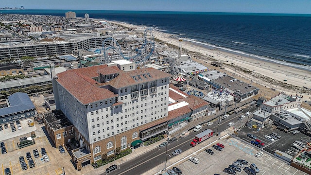 aerial view with a view of the beach and a water view